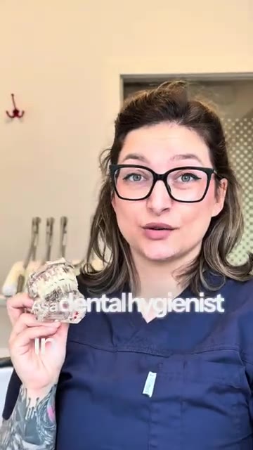 Licensed dental hygienist Denisa Romanescu showing the Waterflosser Pro